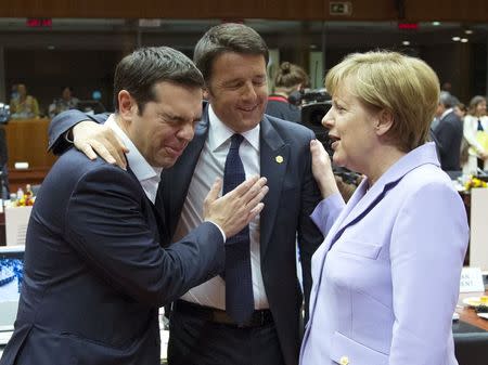 Greek Prime Minister Alexis Tsipras, Italian Prime Minister Matteo Renzi and German Chancellor Angela Merkel attend a European Union leaders summit in Brussels, Belgium, June 25, 2015. REUTERS/Yves Herman