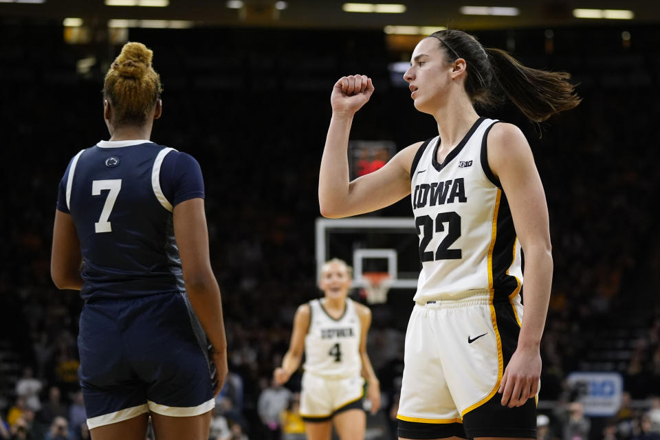 Iowa guard Caitlin Clark (22) reacts after making a basket during the first half of an NCAA college basketball game against Penn State, Thursday, Feb. 8, 2024, in Iowa City, Iowa. (AP Photo/Charlie Neibergall)