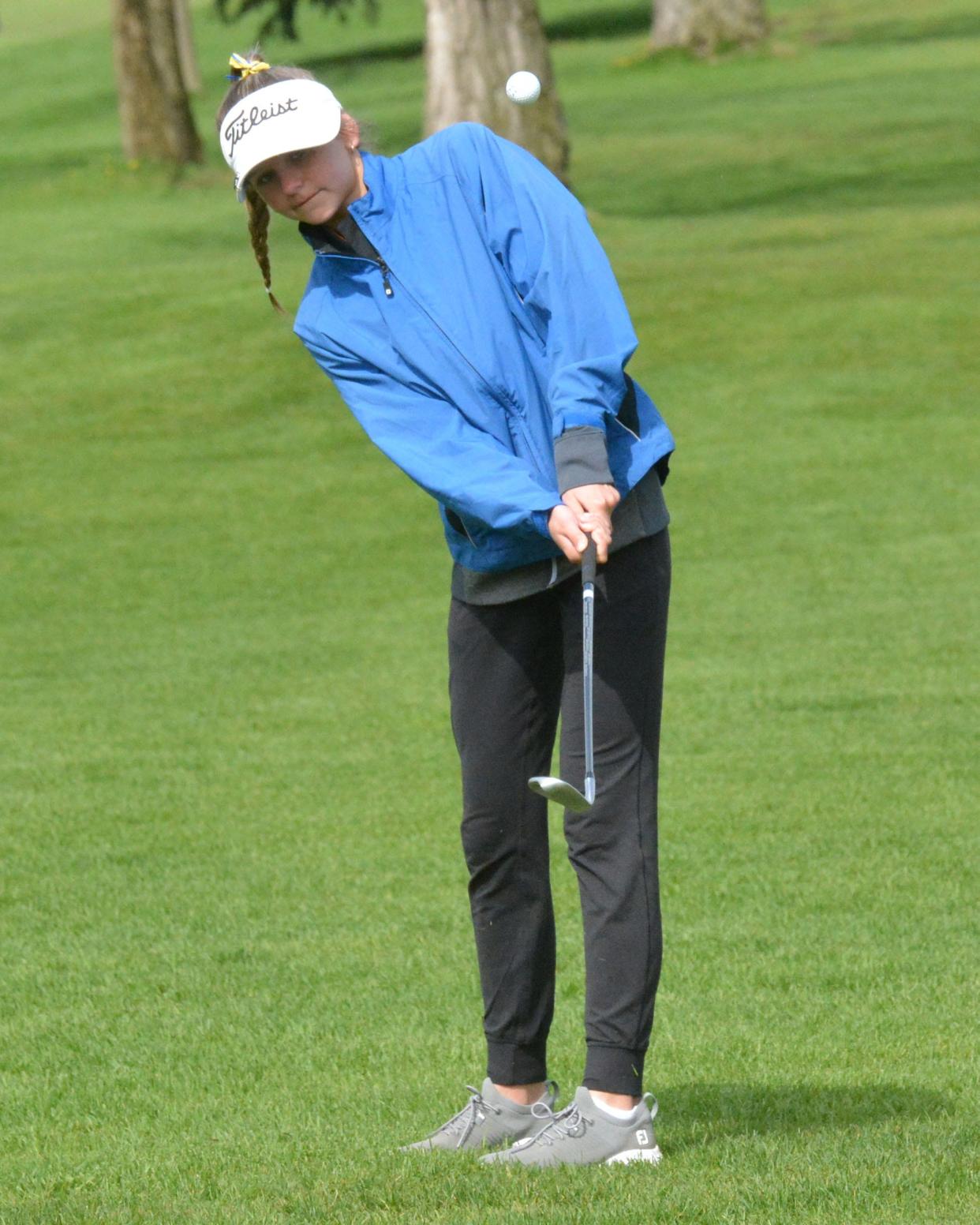 Aberdeen Central's Emma Dohrer pitches to No. 1 Yellow during the Watertown Girls Golf Invitational at Cattail Crossing Golf Course earlier this season.
