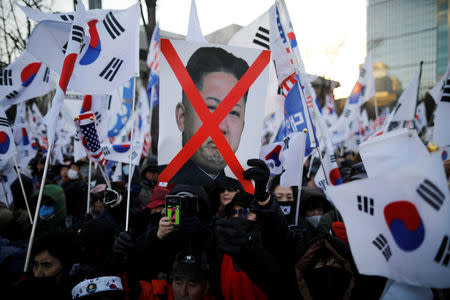 Members of a South Korean conservative civic group take part in an anti-North Korea protest in Seoul, South Korea, December 8, 2018. REUTERS/Kim Hong-Ji