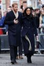 <p> In one of their first public outings as an engaged couple, Harry and Meghan walked arm in arm to greet the crowds in Nottingham, England. Meghan matched Harry in a navy coat from Canadian brand Mackage and carried a&#xA0;Strathberry tote. Navy seems to be one of the Duchess&apos; favorite colors to wear. </p>