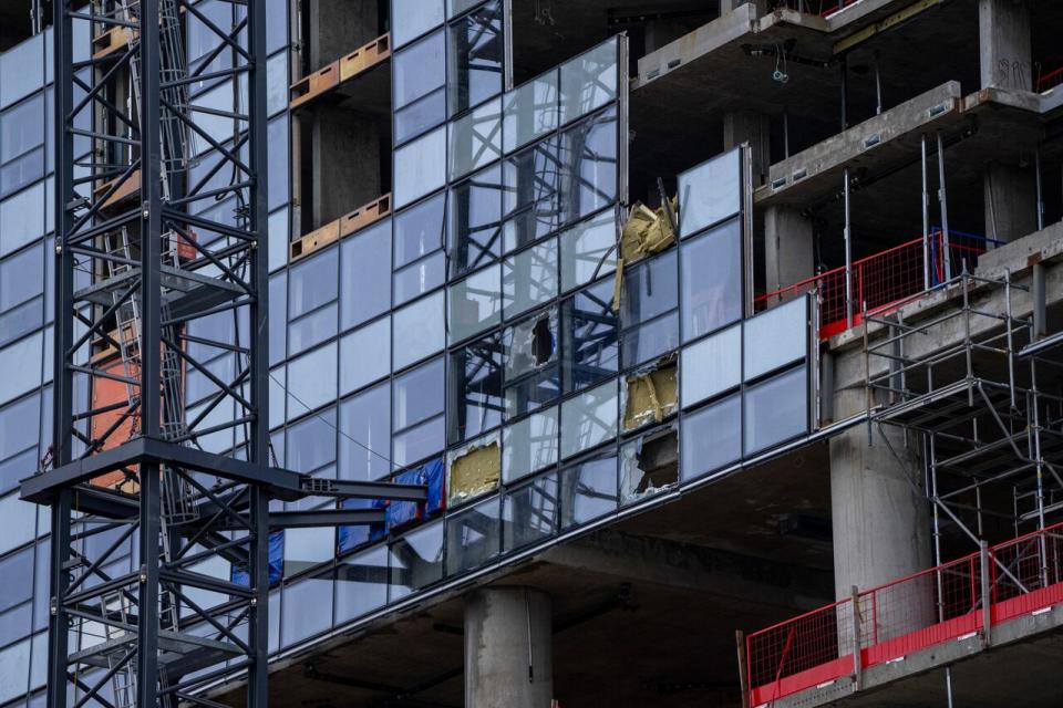 Damage is seen after a load fell from the top of a building smashing multiple floors of the Oakridge Mall construction in Vancouver, B.C. on Wednesday, Feb. 21, 2024.