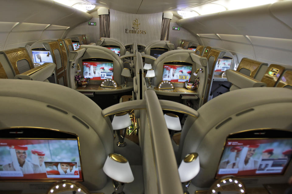 FILE - This Feb. 10, 2013 file photo shows the first class section of an Emirates airlines Airbus A380 at the Dubai airport in Dubai, United Arab Emirates. European plane maker Airbus said Thursday, Feb. 14, 2019, that it will stop making its superjumbo A380 in 2021 for lack of customers, abandoning the world's biggest passenger jet and one of the aviation industry's most ambitious and most troubled endeavors. (AP Photo/Kamran Jebreili, File)