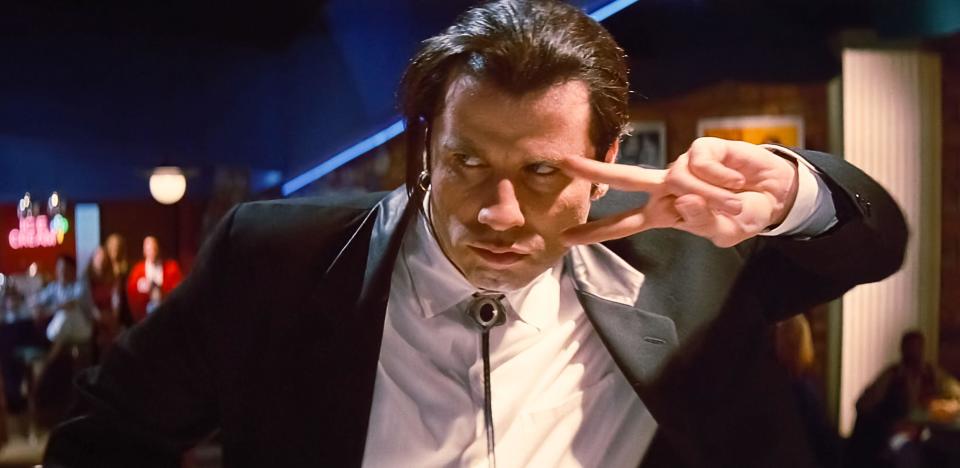 USA. John Travolta in a scene from the (C)Miramax film: Pulp Fiction (1994).  Plot: The lives of two mob hitmen, a boxer, a gangster and his wife, and a pair of diner bandits intertwine in four tales of violence and redemption.  Director: Quentin Tarantino  Ref: LMK110-J6958-180321 Supplied by LMKMEDIA. Editorial Only. Landmark Media is not the copyright owner of these Film or TV stills but provides a service only for recognised Media outlets. pictures@lmkmedia.com
