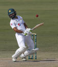 Pakistan's batsman Fawad Alam avoids to play a ball during the second day of the first cricket test match between Pakistan and South Africa at the National Stadium, in Karachi, Pakistan, Wednesday, Jan. 27, 2021. (AP Photo/Anjum Naveed)