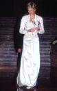 <p>That night, Diana had her own pseudo-Cinderella moment in a white, embellished Victor Edestein gown with a matching bolero. The Princess attended a gala dinner at World Financial Center's Winter Garden.</p>