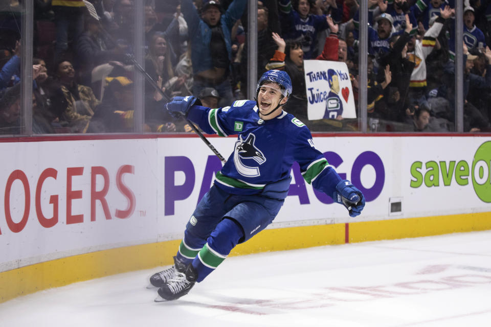 Vancouver Canucks' Andrei Kuzmenko celebrates his third goal against the Anaheim Ducks, during the third period of an NHL hockey game Thursday, Nov. 3, 2022, in Vancouver, British Columbia. (Ben Nelms/The Canadian Press via AP)