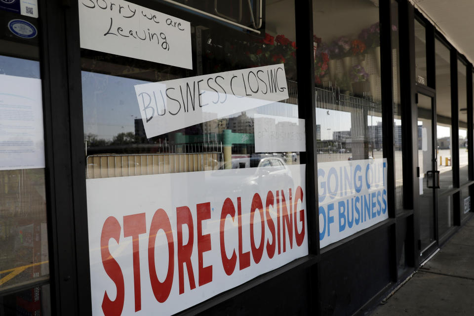 FILE - In this Wednesday, May 13, 2020 file photo, a sign announces a store closing in Niles, Ill. Criminals are seizing on a surge in job losses to steal unemployment benefits from Americans nationwide. The uptick in crime complicates an already tough situation for millions of financially strapped Americans and overwhelmed state unemployment offices. In June 2020, the U.S. Labor Department testified that at least $26 billion will have been wasted, going largely to fraudsters instead of those in need. (AP Photo/Nam Y. Huh)