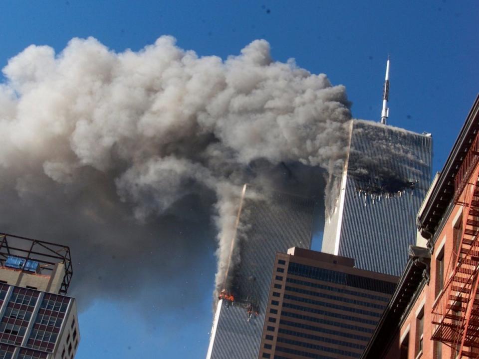 Burning twin towers of the World Trade Centre after hijacked planes crashed into towers (AP)