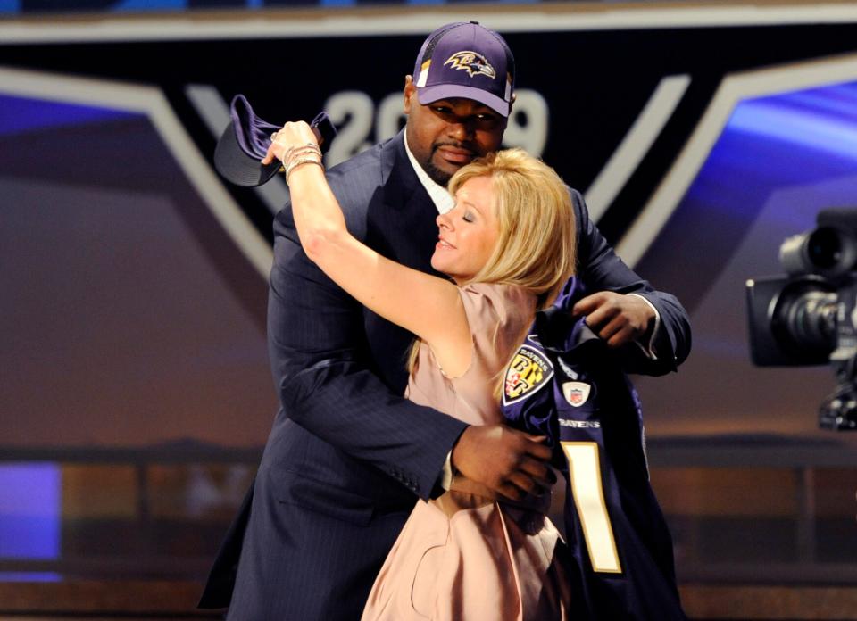 Michael Oher (left) is alleging in a lawsuit that Leigh Anne and Sean Tuohy used and misled him for decades, yet another reminder that Hollywood endings are just that. (REUTERS/Ray Stubblebine)