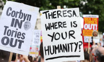 <p>Protesters in Whitehall, London, demanding answers and justice over the Grenfell Tower disaster. (Jonathan Brady/PA Images via Getty Images) </p>