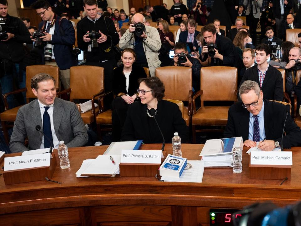 Noah Feldman, Professor of Law at Harvard University, Pamela Karlan, Professor of Law at Stanford University, Michael Gerhardt, Professor of Law at University of North Carolina, and Jonathan Turley, Professor of Law at The George Washington University Law School at the witness table of the House Judiciary Committee Impeachment Inquiry Hearing in Washington.