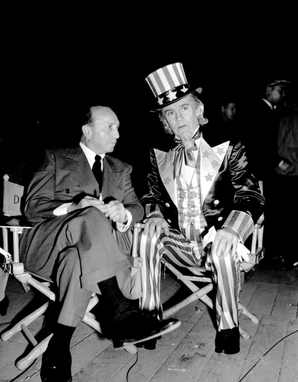 Michael Curtiz, left, and Walter Huston on the set of “Yankee Doodle Dandy”