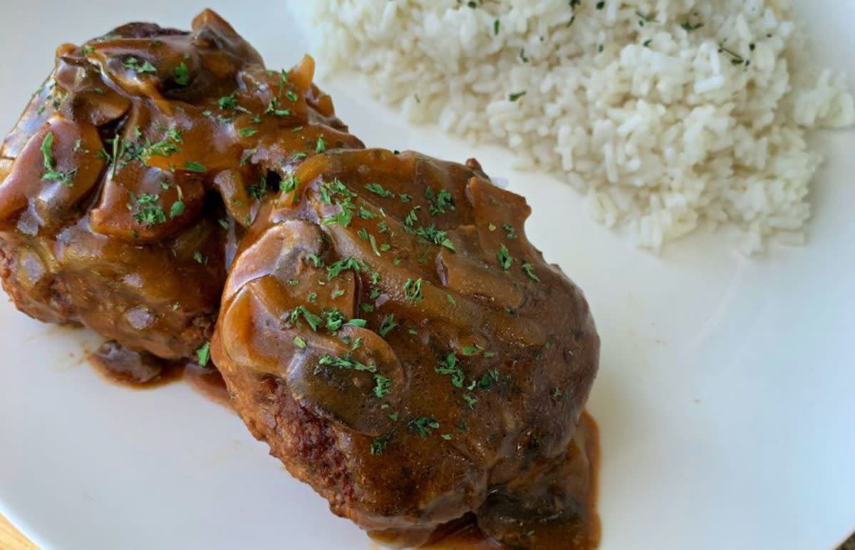 <p>Krista Marshall</p><p>A Sunday supper favorite can now be enjoyed any night of the week.<br></p><p><strong>Get the recipe: <a href="https://parade.com/1093353/kristamarshall/crock-pot-salisbury-steak/" rel="nofollow noopener" target="_blank" data-ylk="slk:Crock Pot Salisbury Steak;elm:context_link;itc:0;sec:content-canvas" class="link rapid-noclick-resp">Crock Pot Salisbury Steak</a></strong></p>