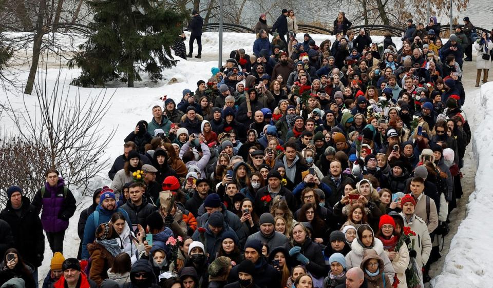 People walk towards the Borisovskoye cemetery during the funeral of Russian opposition politician Alexei Navalny (Reuters)