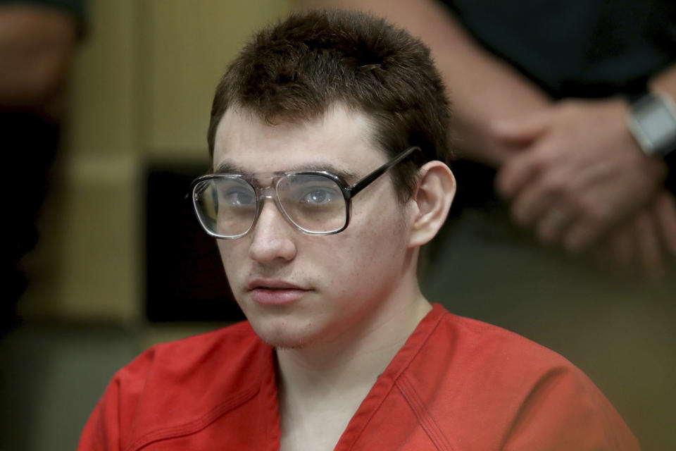 Parkland school shooting suspect Nikolas Cruz sits in the courtroom for a status hearing at the Broward Courthouse in Fort Lauderdale, Fla., Thursday, Feb. 21, 2019. Circuit Judge Elizabeth Scherer said at a brief hearing that she intends to set a definitive trial date soon for 20-year-old Nikolas Cruz, who faces the death penalty if convicted. Cruz is accused of killing 17 and wounding 17 in the February 2018 mass shooting at Marjory Stoneman Douglas High School in Parkland, Fla. (Amy Beth Bennett/South Florida Sun-Sentinel via AP, Pool