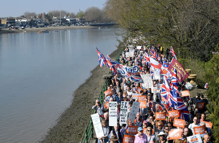 Pro-Brexit protesters take part in the March to Leave demonstration, as they walk along the River Thames, in London, Britain March 29, 2019. REUTERS/Toby Melville