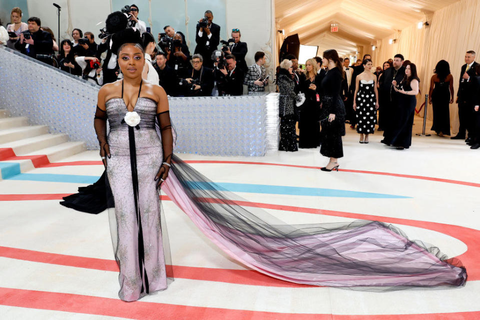 Quinta Brunson attends The 2023 Met Gala in a purple gown