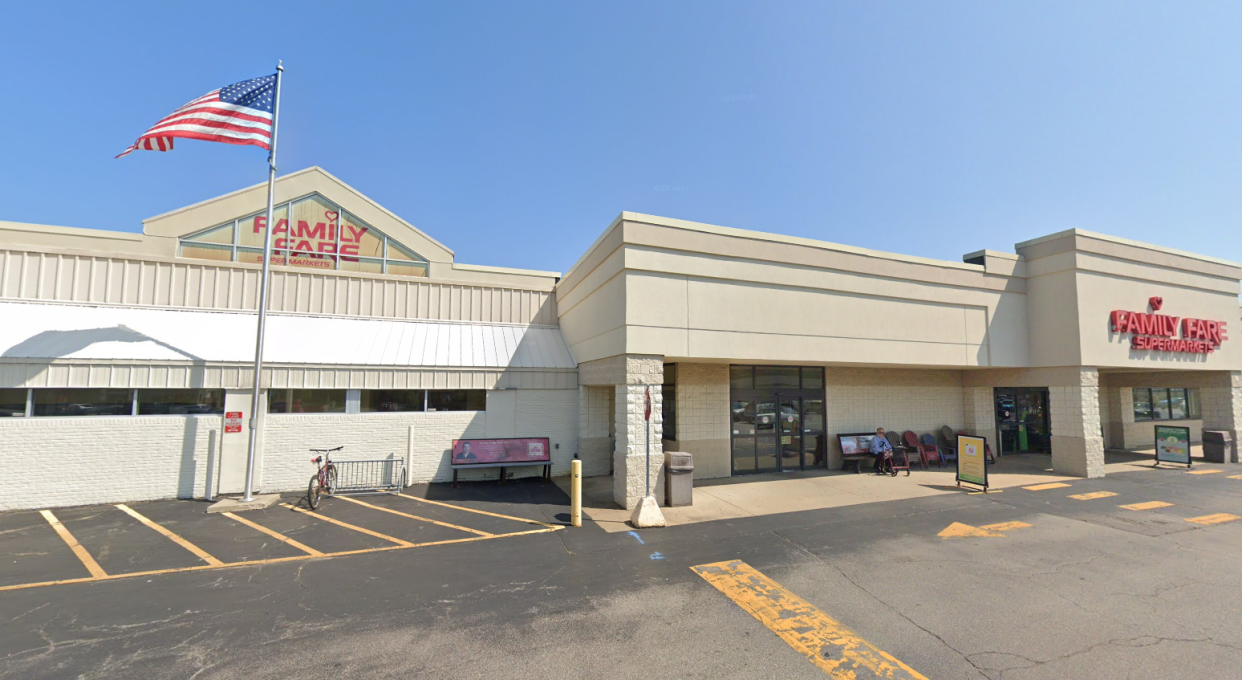 A woman was found living in the rooftop sign of a Family Fare Supermarket in Midland, Michigan on April 23, 2024, police said. She was found living behind the sign seen in this photo on the left.
