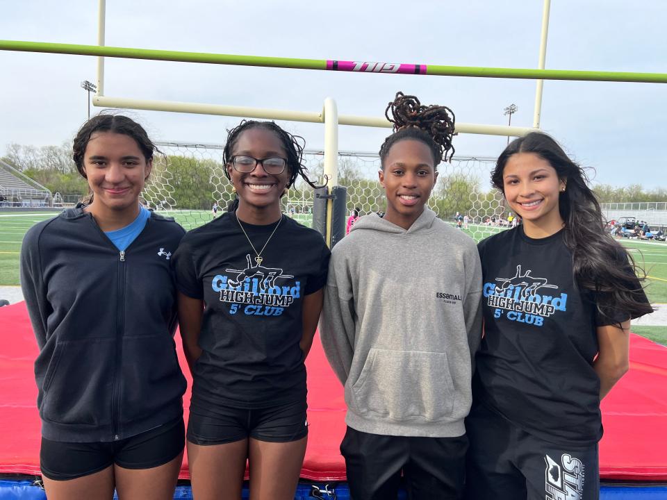 Rockford Guilford high jumpers (from left to right) London Webster, Anna Jones, Zariah Burnett and Bianca Colon pose near the high jump pit on Wednesday, April 24, 2024, at Guilford High School in Rockford.