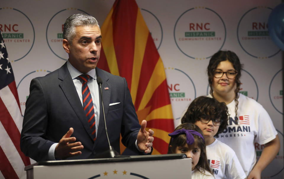 CORRECTS DATE TO AUG. 19, 2022, INSTEAD OF OCT. 18, 2022 - Juan Ciscomani, Republican U.S. House candidate, 6th District, speaks at the RNC Hispanic Community Center, in Tucson, Ariz., Aug. 19, 2022. Arizona's only open congressional seat has featured some buzzwords spoken by candidates on both sides: extreme and the American dream. Ciscomani says he's living the American dream as someone who became a naturalized U.S. citizen. Democrat Kirsten Engel says she's trying to renew the American dream by fighting against a pre-statehood ban on abortion in Arizona. (Rick Wiley/Arizona Daily Star via AP)