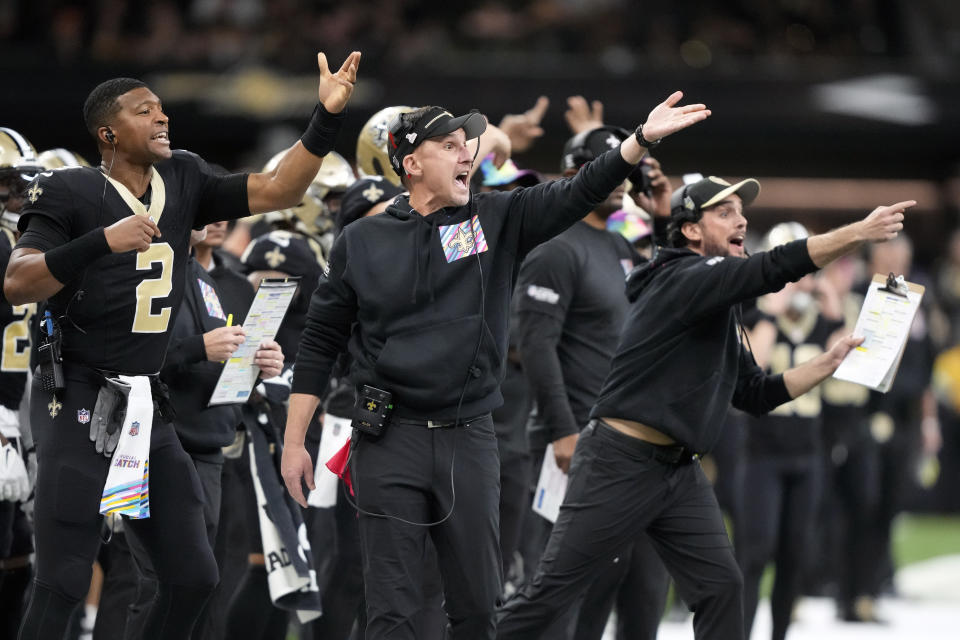 New Orleans Saints head coach Dennis Allen, center, calls a player off the field before a play in the second half of an NFL football game against the Jacksonville Jaguars in New Orleans, Thursday, Oct. 19, 2023. (AP Photo/Gerald Herbert)