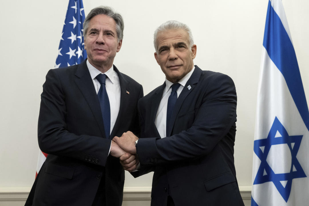 Secretary of State Antony Blinken, left, meets with Israeli opposition leader Yair Lapid, in Tel Aviv, Israel, on Thursday