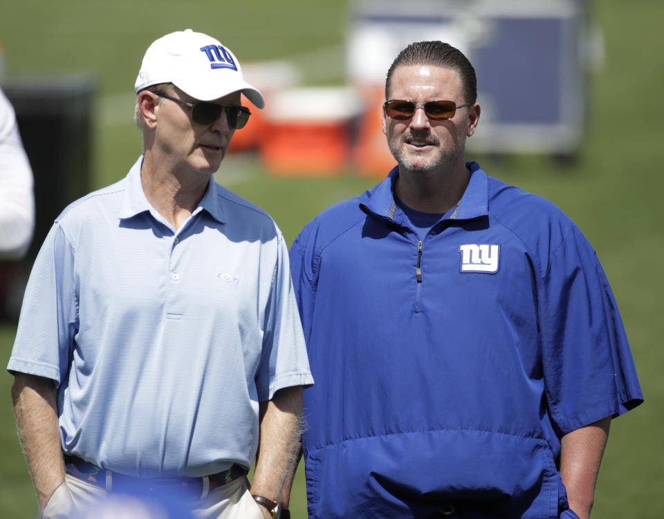 Giants co-owner John Mara (L) took away Ben McAdoo's key card. (AP) 