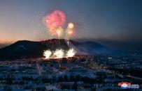 Fireworks explode above during a ceremony celebrating the completion of township of Samjiyon County, North Korea