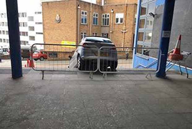 It looks like a scene from a film, but this car was spotted stuck on a flight of steps after its elderly driver took a wrong turn after following her sat nav.