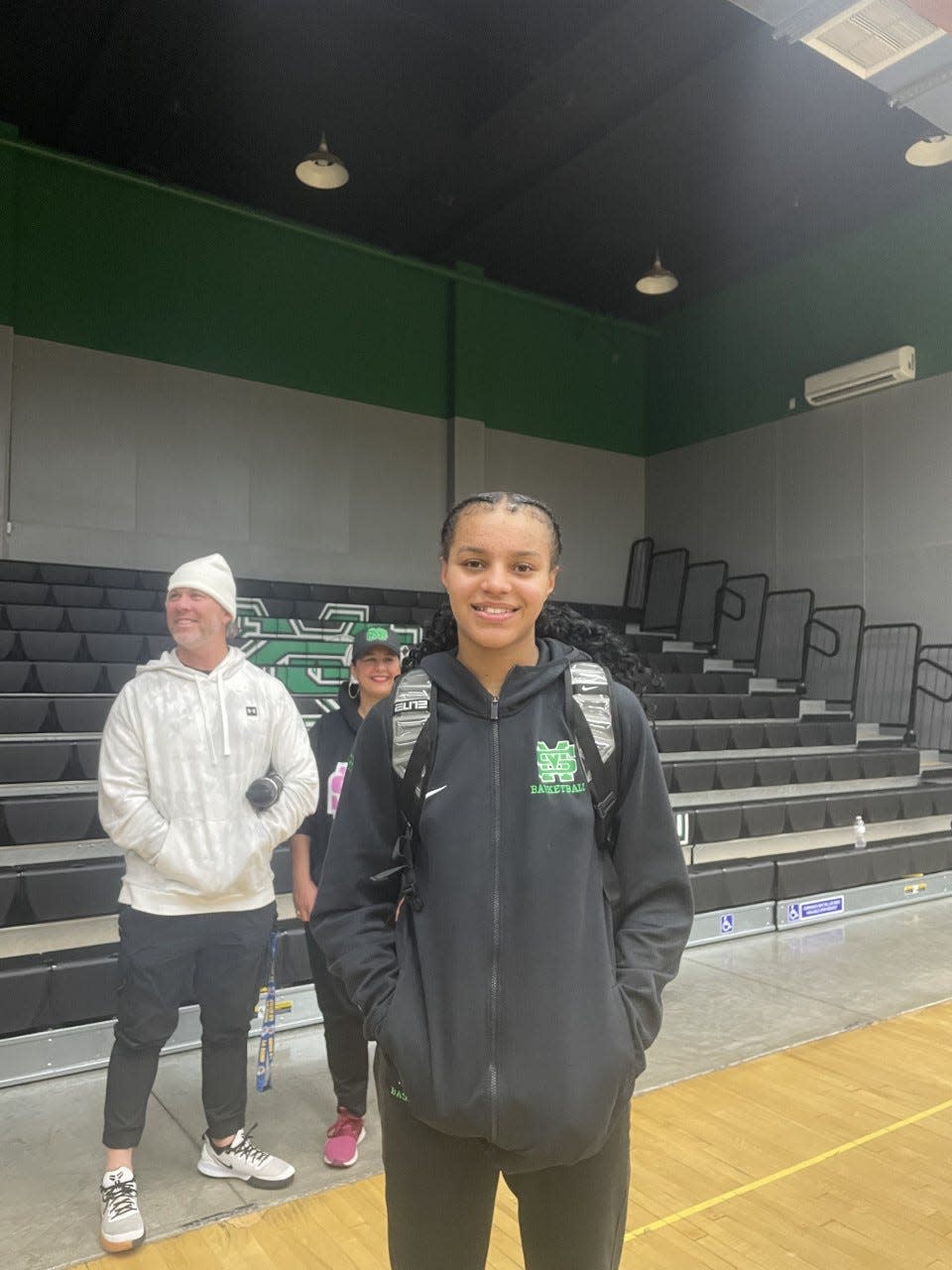 Jordan Lee of St. Mary's girls basketball posses for a photo following the team's game against Clovis on Saturday at St. Mary's High school.