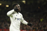 Leeds United's Wilfried Gnonto, celebrates after scoring the opening goal of the game during the English Premier League soccer match between Manchester United and Leeds United at Old Trafford in Manchester, England, Wednesday, Feb. 8, 2023. (AP Photo/Dave Thompson)