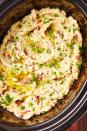 <p>Make incredible mashed potatoes while saving space on the stove.</p><p>Get the recipe from <a href="https://www.delish.com/cooking/recipe-ideas/recipes/a56448/crock-pot-garlicky-mashed-potatoes-recipe/" rel="nofollow noopener" target="_blank" data-ylk="slk:Delish" class="link rapid-noclick-resp">Delish</a>.</p>