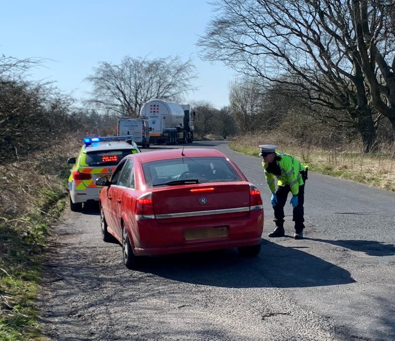 Sgt Cording from North Yorkshire Police conducts road check in Harrogate