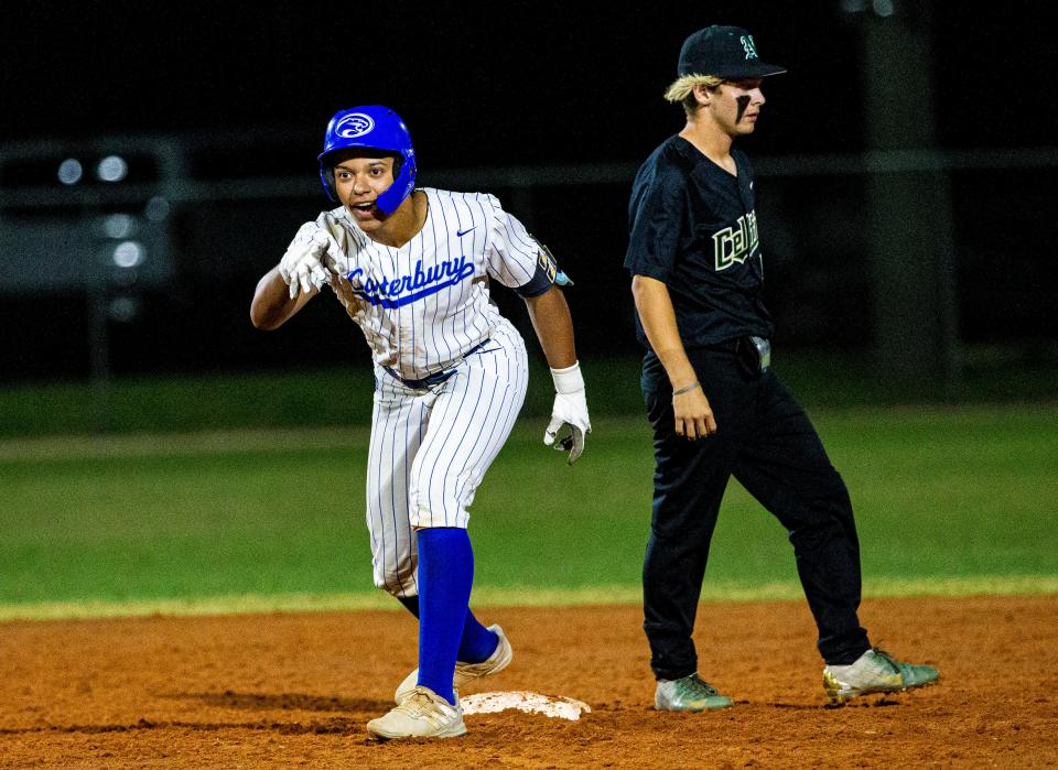  Evan Taveras of Canterbury celebrates a double during the Private 8 Championship at Terry Park on Friday, March 10. 2023. 