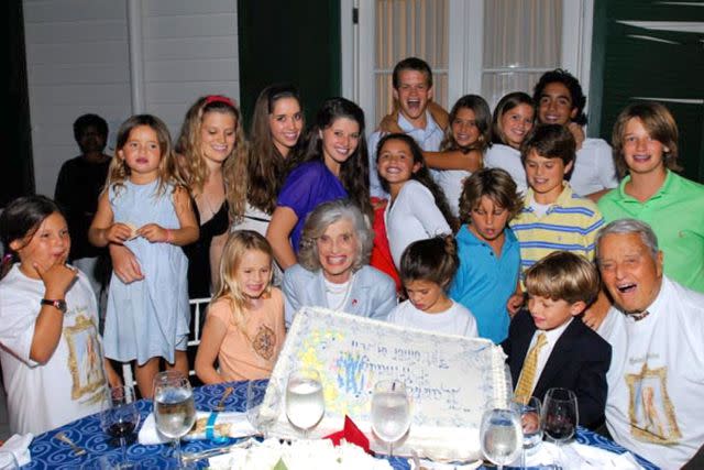Eunice Kennedy Shriver and Sargent Shriver pose for a family photo with their grandchildren