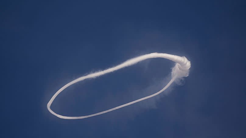 A volcanic vortex ring emerges from a new pit crater on the north side of the southeast crater of the Etna Volcano in Sicily, Italy, Friday, 5 April 2024.