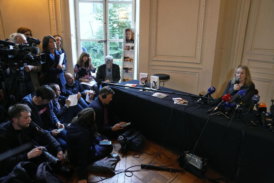 French author Annie Ernaux, right, gives a press conference after being awarded 2022's Nobel Prize in literature, in Paris, Thursday, Oct. 6, 2022. The 82-year-old was cited for "the courage and clinical acuity with which she uncovers the roots, estrangements and collective restraints of personal memory," the Nobel committee said. (AP Photo/Michel Euler)