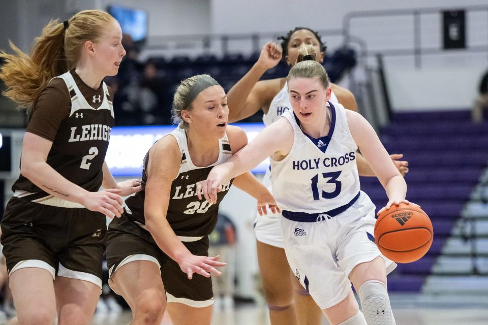 Frannie Hottinger, middle, was the Patriot League player of the year at Lehigh. She will play her final season of college basketball at Marquette.