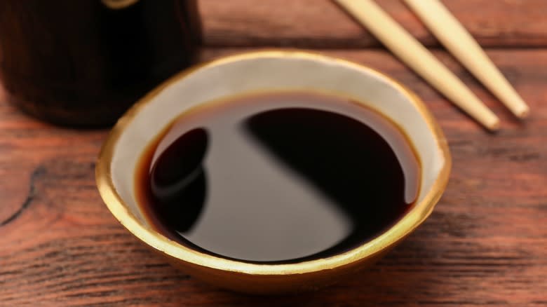 soy sauce with chopsticks