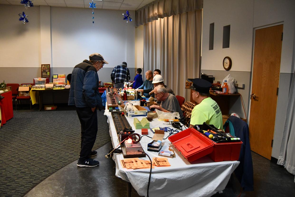 Model railroad experts are on hand to help visitors with their personal trains at the Rutherford B. Hayes annual train clinic, held Saturday.