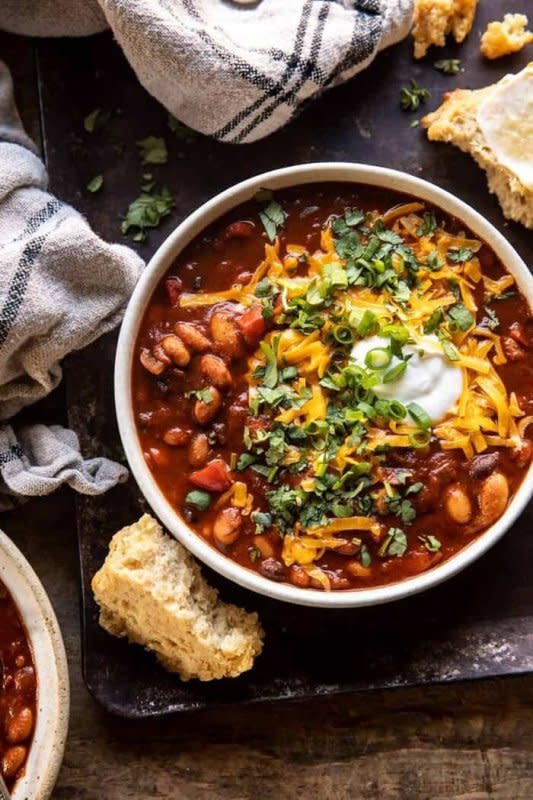 <p>Half Baked Harvest</p><p>Made with four kinds of beans, bell peppers, smoky chipotle peppers, and served with plenty of sharp cheddar cheese, this low and slow cooked chili is a hearty, healthy, and cozy vegetarian meal. </p><p><strong>Get the recipe: <a href="https://www.halfbakedharvest.com/chipotle-bean-chili/" rel="nofollow noopener" target="_blank" data-ylk="slk:Healthy Slow Cooker Chipotle Bean Chili;elm:context_link;itc:0;sec:content-canvas" class="link ">Healthy Slow Cooker Chipotle Bean Chili</a></strong></p>