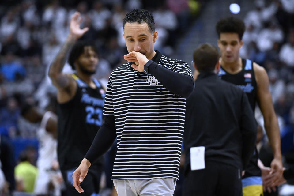 Marquette head coach Shaka Smart walks onto the court during a timeout in the second half of an NCAA college basketball game against UConn, Saturday, Feb. 17, 2024, in Hartford, Conn. (AP Photo/Jessica Hill)