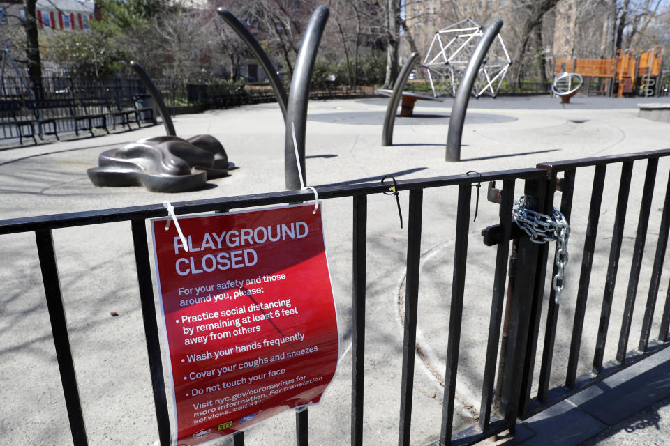Vanderbilt playground in Brooklyn's Prospect Park is closed on Thursday, April 2, 2020, in New York. On Wenesday, New York Gov. Andrew Cuomo ordered all of New York city's playgrounds shut to slow the spread of the coronavirus. The governor followed calls from public-health experts and many City Council members to shut the playgrounds as families gathered there. But the closures presented a new challenge for families weathering a lockdown that also closed schools. (AP Photo/Kathy Willens)