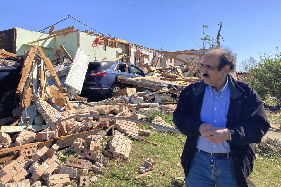 Masoud Shahed-Ghaznavi stands in front of his Little Rock, Ark., home that was destroyed by Friday’s tornado on Saturday, April 1, 2023. Unrelenting tornadoes that tore through parts of the South and Midwest that shredded homes and shopping centers. (AP Photo/Andrew DeMillo)