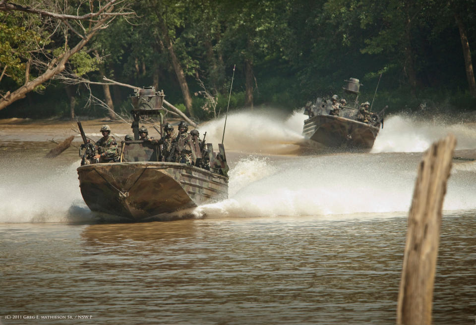 Special Warfare Combatant-craft Crewman (SWCC) move though rivers at a high rate of speed in specially designed Riverine boats outfitted with heavy weapons.  Photo: (C) 2011 Greg E. Mathieson Sr. / NSW Publications, LLC