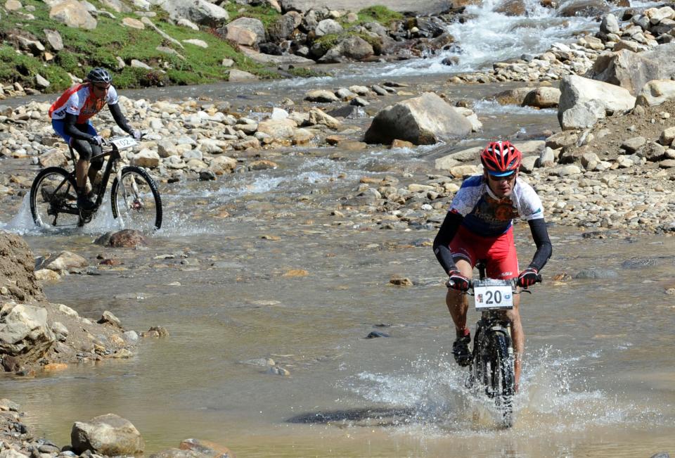 Slovakia's Martin Frano (R) and Denmark's Henrik Soeberg ride during the first stage of the Himalayas 2011 International Mountainbike Race in the Gitti Das mountainous area in Pakistan's tourist region of Naran in Khyber Pakhtunkhwa province on September 16, 2011. The cycling event, organised by the Kaghan Memorial Trust to raise funds for its charity school set up in the Kaghan valley for children affected in the October 2005 earthquake, attracted some 30 International and 11 Pakistani cyclists. AFP PHOTO / AAMIR QURESHI (Photo credit should read AAMIR QURESHI/AFP/Getty Images)
