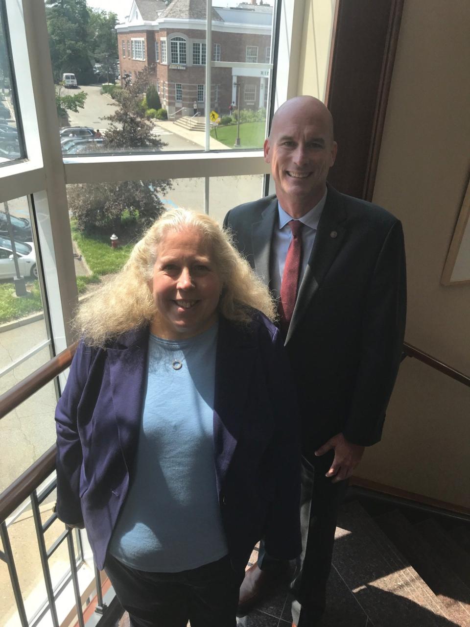 Ridgewood Village Clerk Heather Mailander, who served for seven years as both clerk and manager, with newly-installed Village Manager Keith Kazmark.