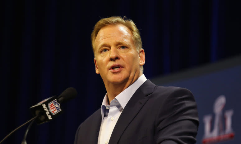 NFL commissioner Roger Goodell talking at a podium at the Super Bowl.