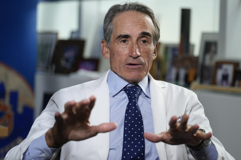 Dr. David Altchek talks to reporters in his office in New York, Thursday, Feb. 29, 2024. (AP Photo/Seth Wenig)